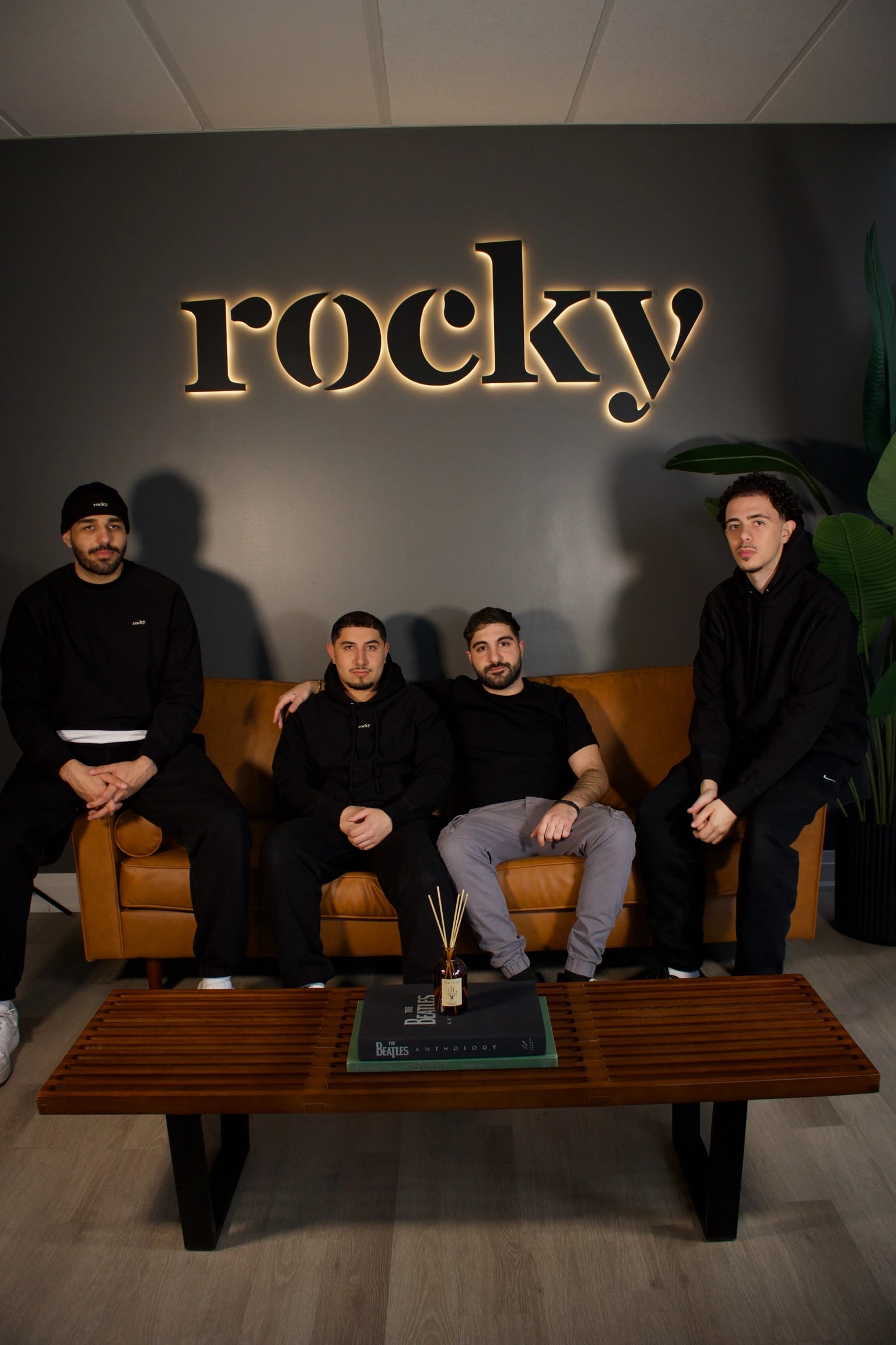 Group of five people wearing black MyRocky merchandise